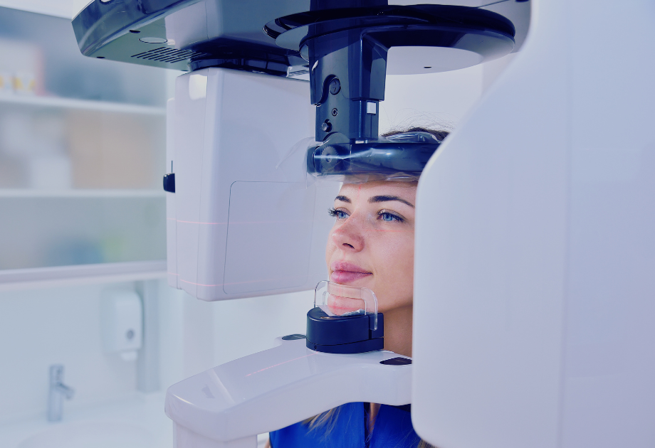 a woman rest her chin on a medical device