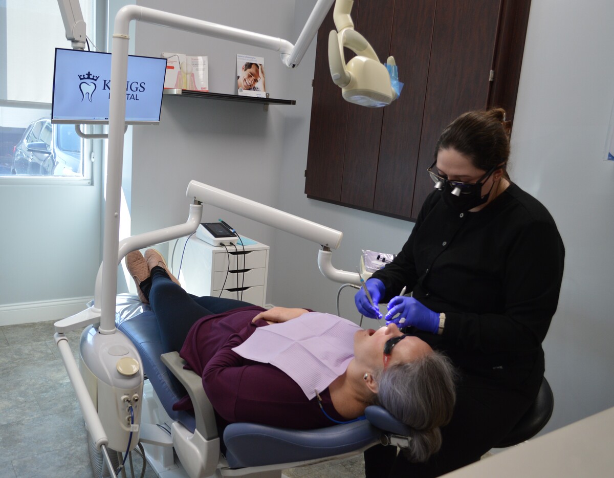 Woman and Nurse during teeth cleaning