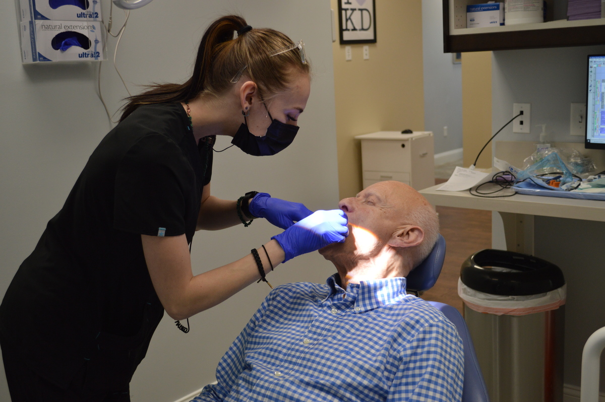 Patient and nurse during dental checkup